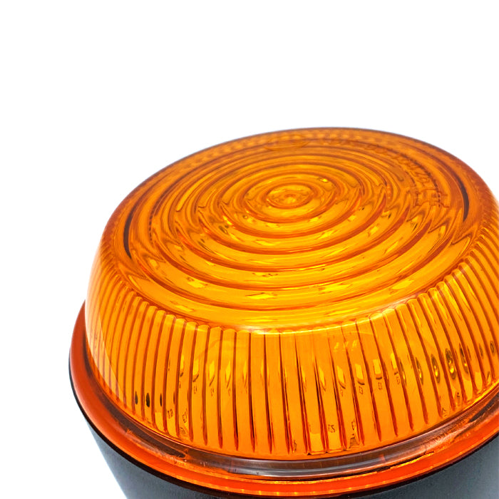 Amber LED Mini Beacon with polycarbonate base, featuring a Fresnel design and 20x LED lights, ideal for industrial vehicles.