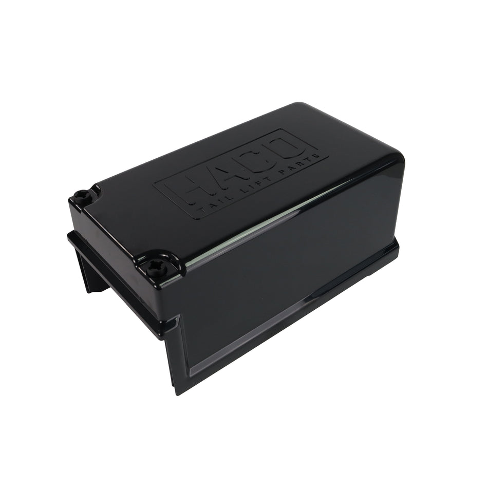 Compact Powerpack Cover HACO for Dhollandia M3062.H, a black rectangular component with visible text, suitable for commercial trailer tail lift systems.