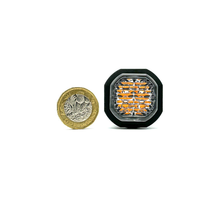 Button Blast LED Warning Lights - Amber (Pair), featuring compact design with coin-like profile, ideal for discreet vehicle installation, offering high-powered LED lighting and multiple flash patterns.