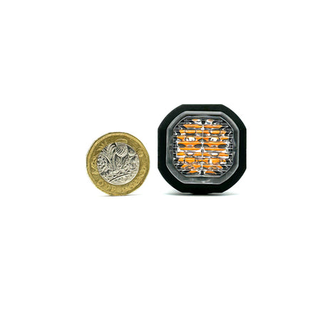 Button Blast LED Warning Lights - Amber (Pair), featuring compact design with coin-like profile, ideal for discreet vehicle installation, offering high-powered LED lighting and multiple flash patterns.