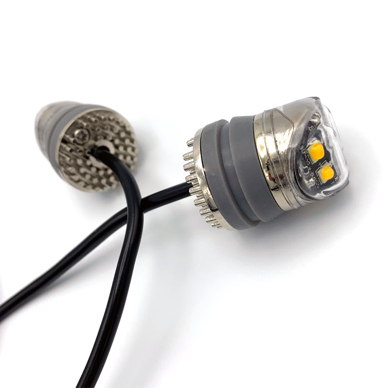 Close-up of Hide Away Covert AMBER LED Light Kit showing cable and connector, designed for discreet vehicle installation with high-powered LEDs and multiple flash patterns.