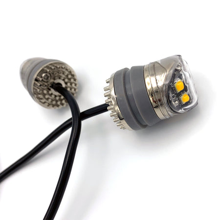 Close-up of Hide Away Covert AMBER LED Light Kit showing cable and connector, designed for discreet vehicle installation with high-powered LEDs and multiple flash patterns.