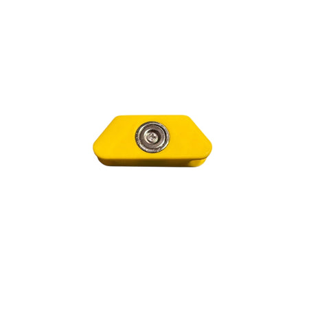 Ratchet Strap Magnetic Application Aid: Yellow plastic block with metal insert, designed for securing wire claw hooks on lorries, enhancing efficiency during loading. Fast UK delivery.