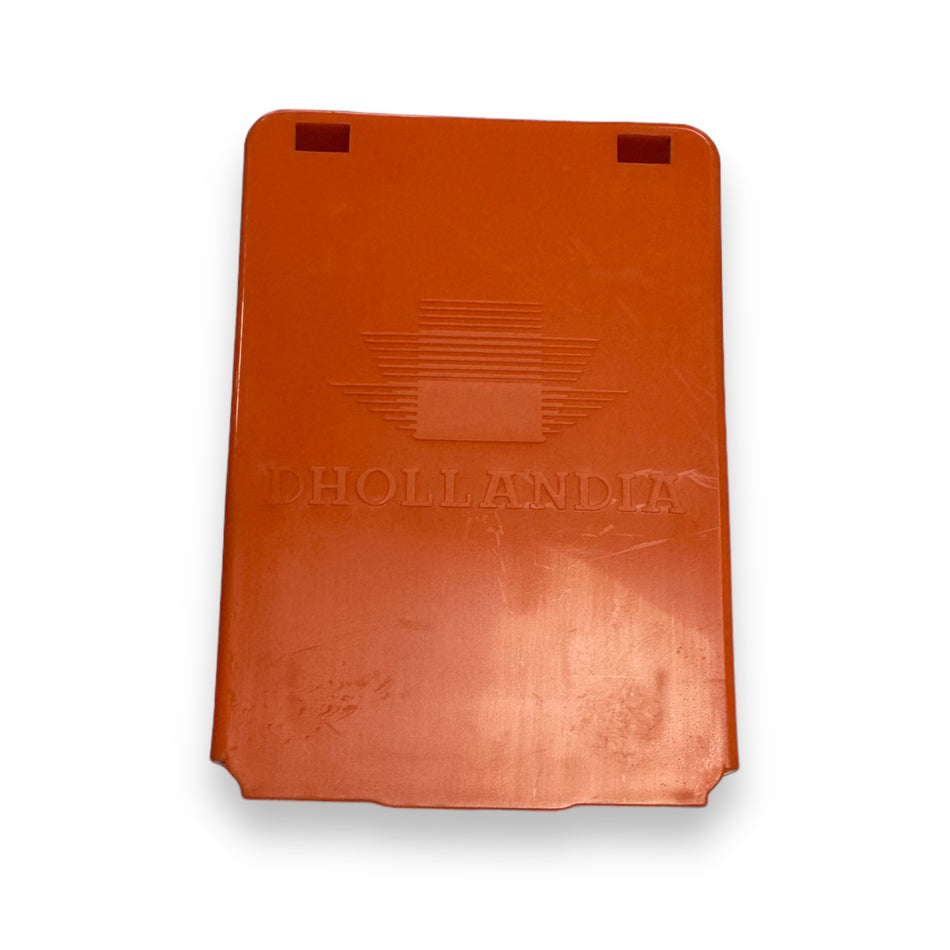 Dhollandia Cover Sliding Tube M1421, an orange rectangular accessory case, designed for commercial trailers, visible in close-up showing its structural features.