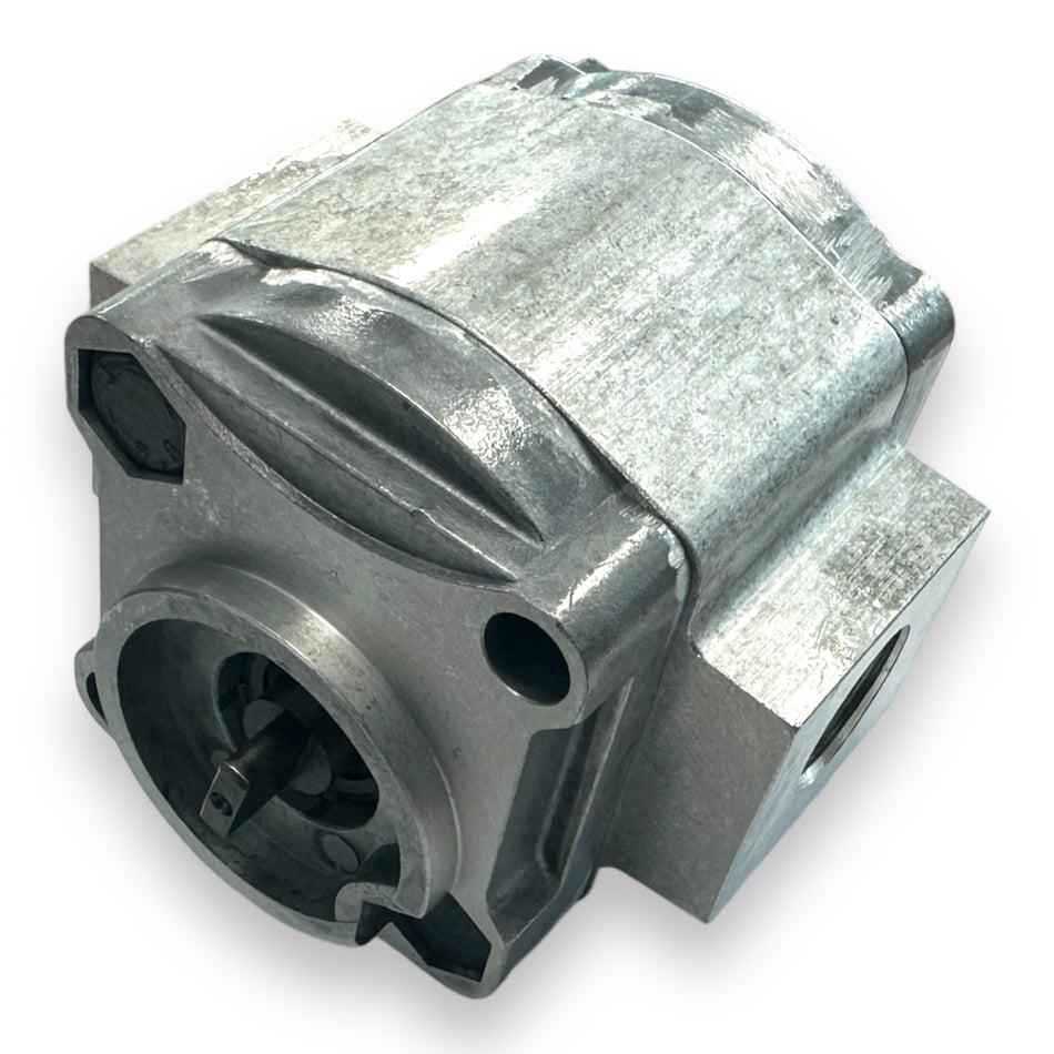 Pump 17A - 3.2cc - 6L metal component, featuring drilled holes and screws, designed for Dhollandia Tail Lifts, depicting a close-up view of its detailed metal surface.
