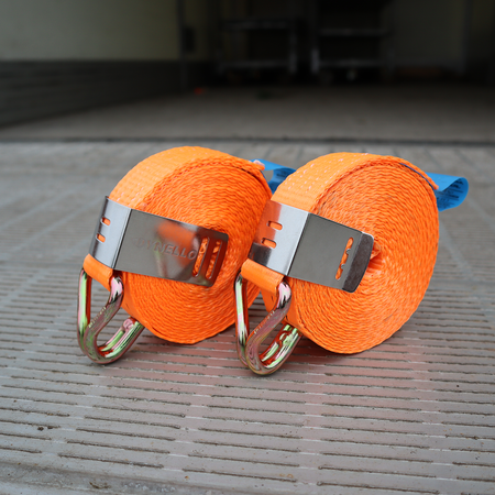 Dynello 35mm Strap Clip (6 pack) shown coiled with metal hooks, designed for organizing and securing ratchet straps efficiently.