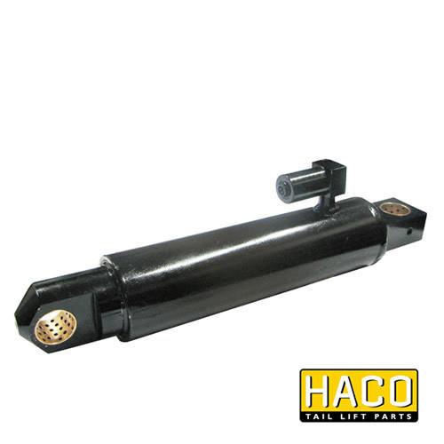 Lift Ram Cylinder HACO for MBB 1402453, featuring a black metal design with holes and screws, ideal for MBB tail lift systems.