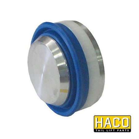 Piston HACO to Suit M4440.070, a round metal component for Dhollandia tail lifts, showcased in close-up, highlighting its size and suitability for commercial vehicle use.