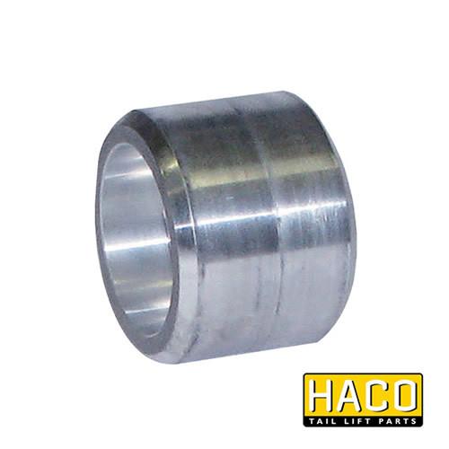 Spring holder HACO for Dhollandia Tail Lift, metal cylinder part suitable for M4803, featuring a logo. Essential hardware for large commercial trailers.