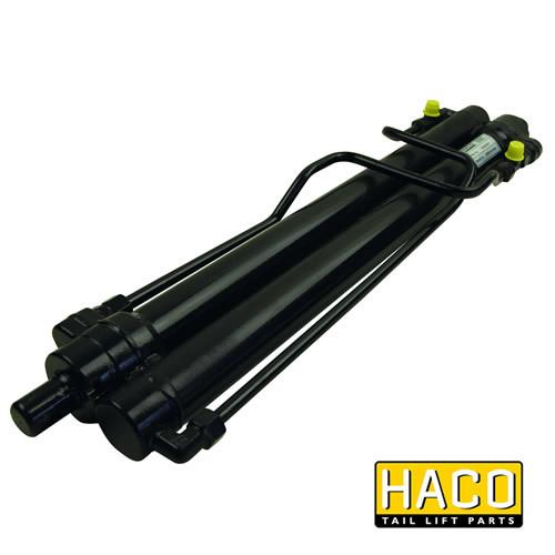 Retraction cylinder HACO DKB1100 designed for Dhollandia Tail Lifts, featuring yellow knobs, compatible with part CAD13.040.30.1100. Comes with a two-year warranty.