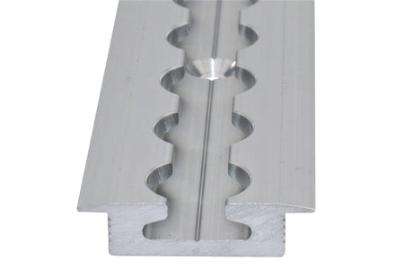 Recessed Captive Track for commercial vehicles, showcasing close-up details of the metal surface and design features, highlighting precision for secure installation and durability.
