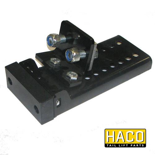 Rubber bolted HACO piece with screws, compatible with Dhollandia M5252 tail lifts, featuring detailed metalwork for secure trailer attachment.
