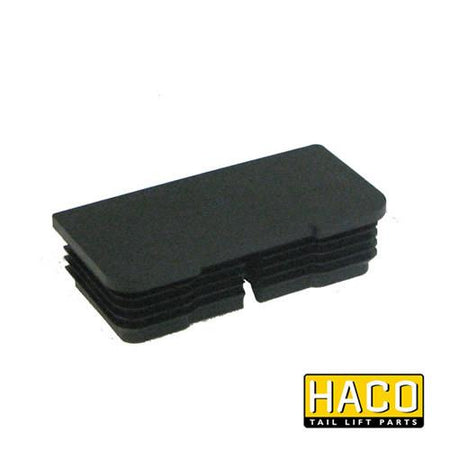 Cap HACO to suit Dhollandia M0495R, black rectangular tail lift part, 100x50mm, designed for commercial vehicle trailers.