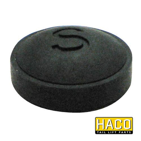 Button foot control ‘S’ HACO for Bar Cargo 101100942, featuring a distinctive 'S' on its surface, designed for commercial trailer parts by Nationwide Trailer Parts Ltd.
