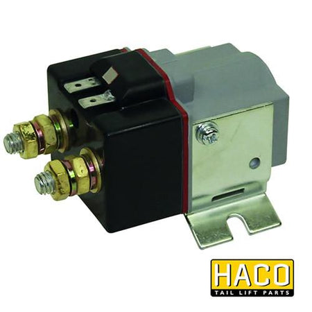 Starter solenoid 12V SW80 HACO, black and silver, compatible with Ratcliff Palfinger Tail Lifts, shown in a close-up of its metal corner.
