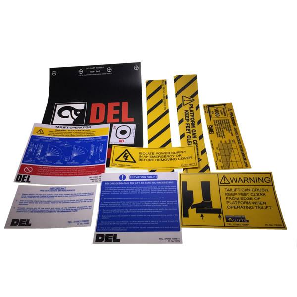 Decal Kit C/W Flags for TL1000, featuring operating and safety stickers with instructions, designed for large commercial trailers and vehicles.