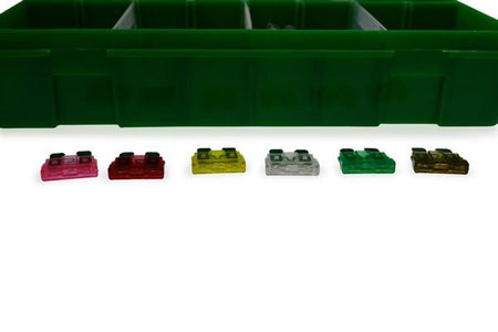 Blade Fuse Assortment Box with colorful plastic compartments containing various amp-rated fuses, ideal for commercial trailer electrical systems.
