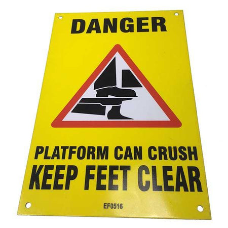 Keep Feet Clear Plate with bold black text on a yellow background, designed for safety on commercial trailers and vehicles.